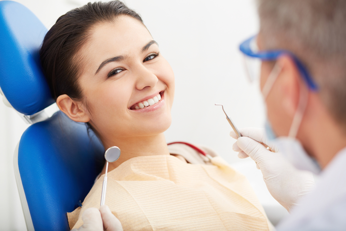 young woman visiting the dentist