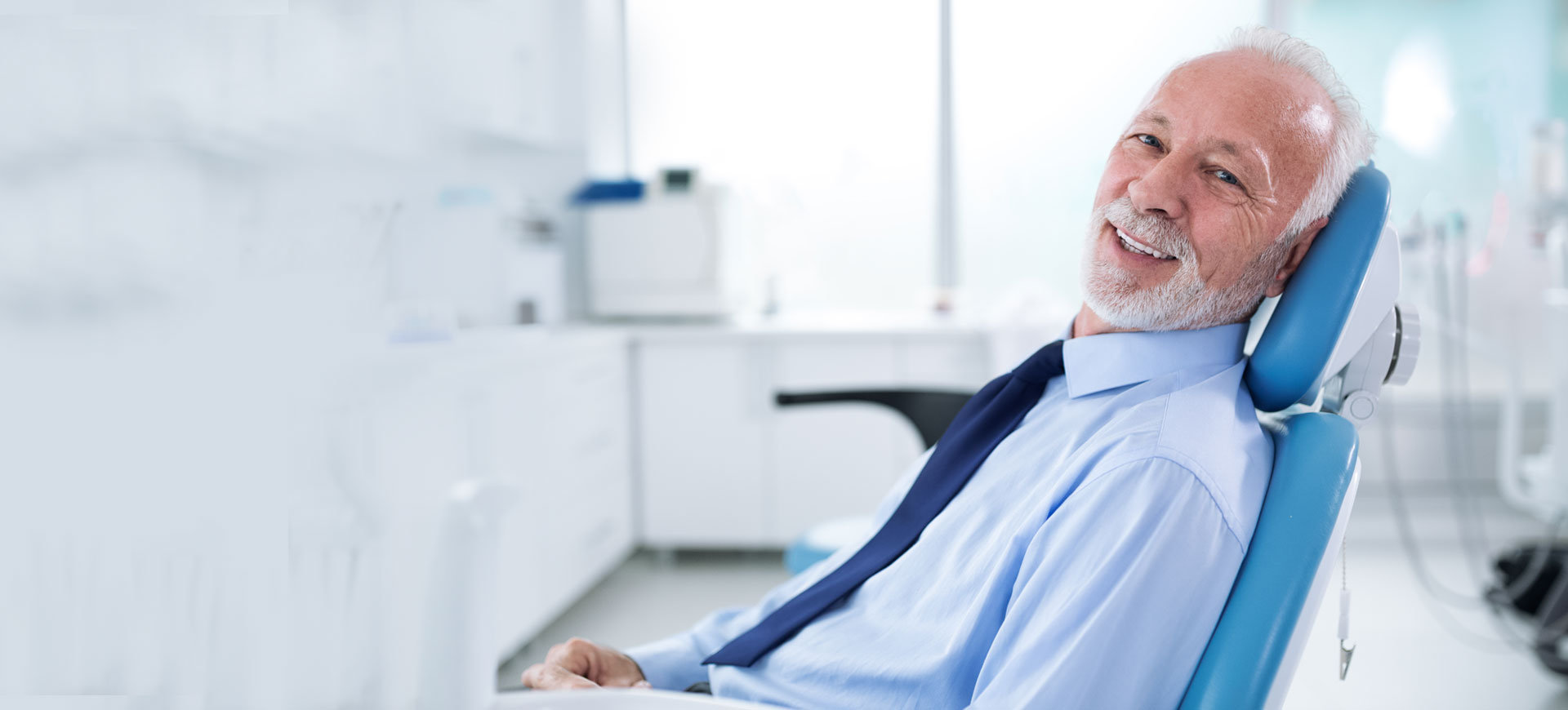 older man visiting the dentist