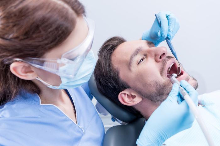 man getting a dental checkup