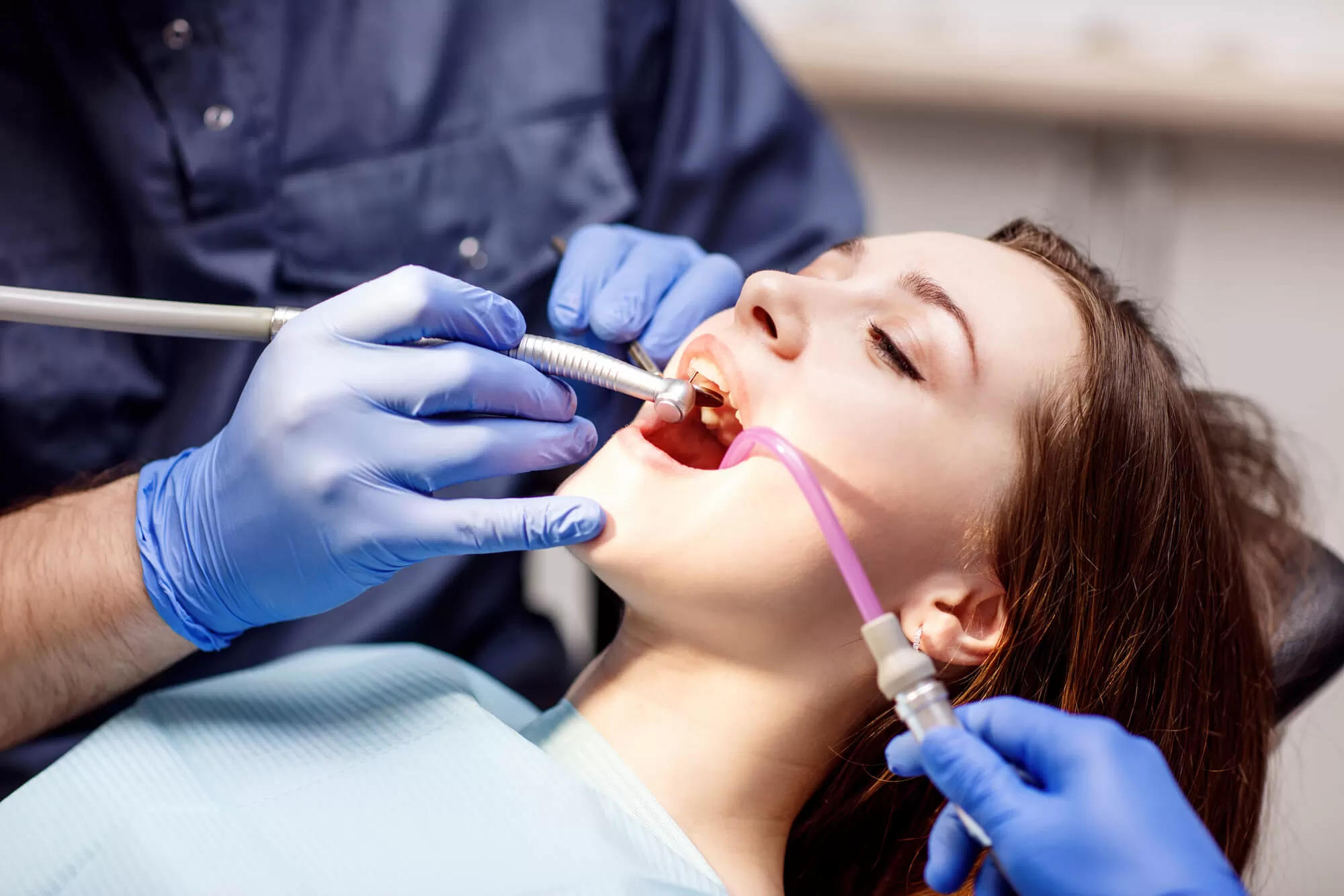 dentist-performing-a-dental-cleaning-in-vero-beach