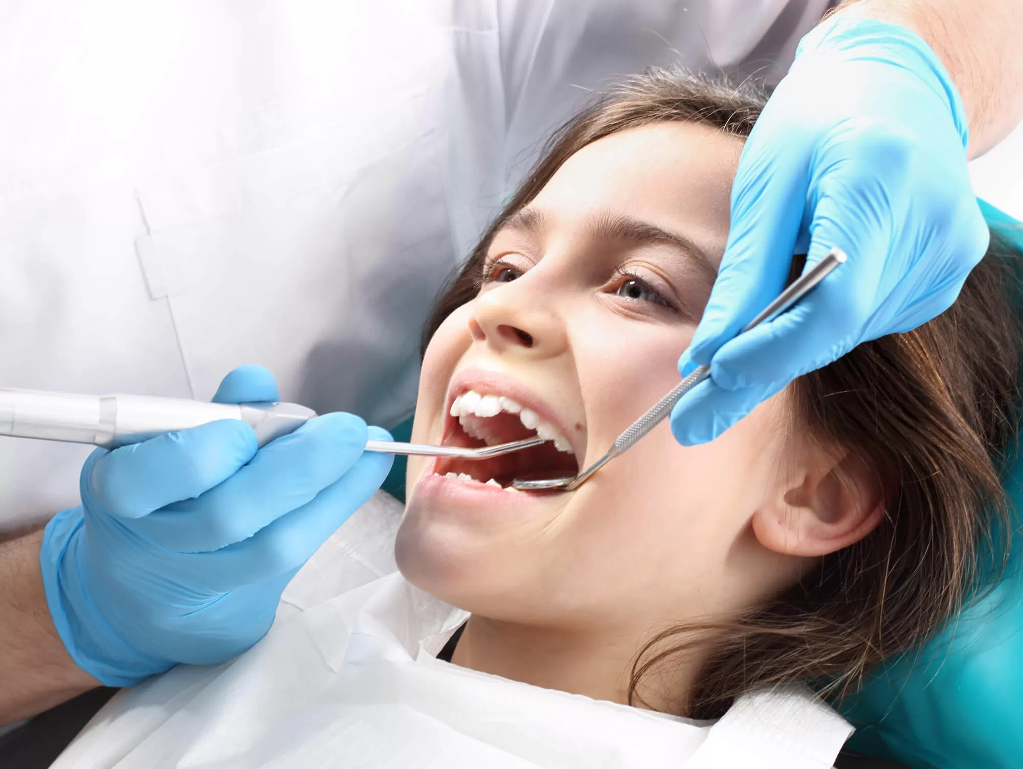 Dental Cleaning in Vero Beach to a young patient