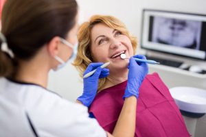 older woman at the dentist