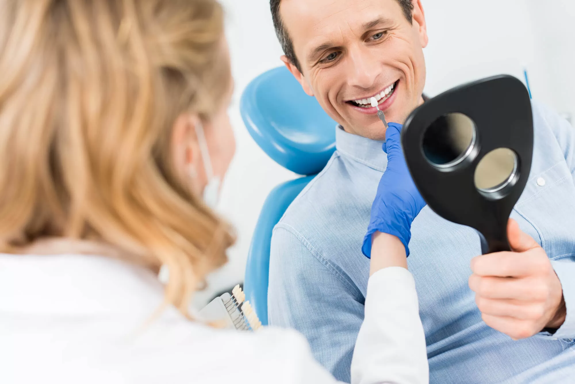 a male patient smiling before getting Dental Implants in Vero Beach 