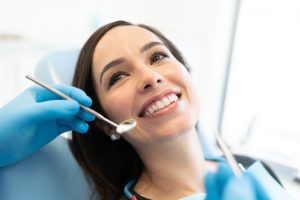 woman smiling at the dentist